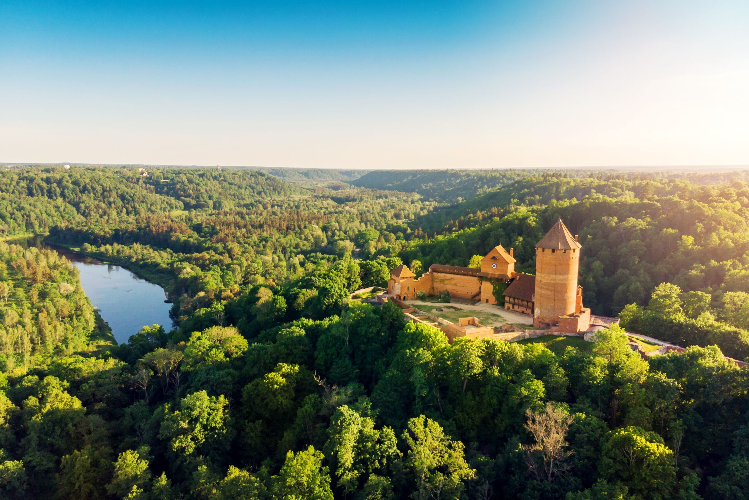 Latvia-Gauja-river-castle-sunset-ss-scaled-1-1